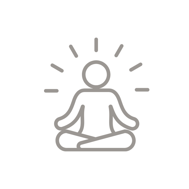 A person in a meditation pose with a radiant background.